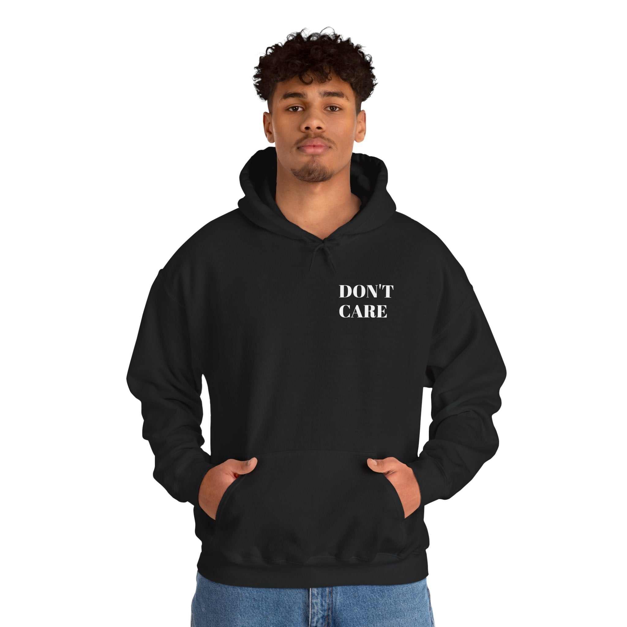 hoodies for men and women Black DON'T CARE hoodie with kangaroo pocket and adjustable hood worn by male model
