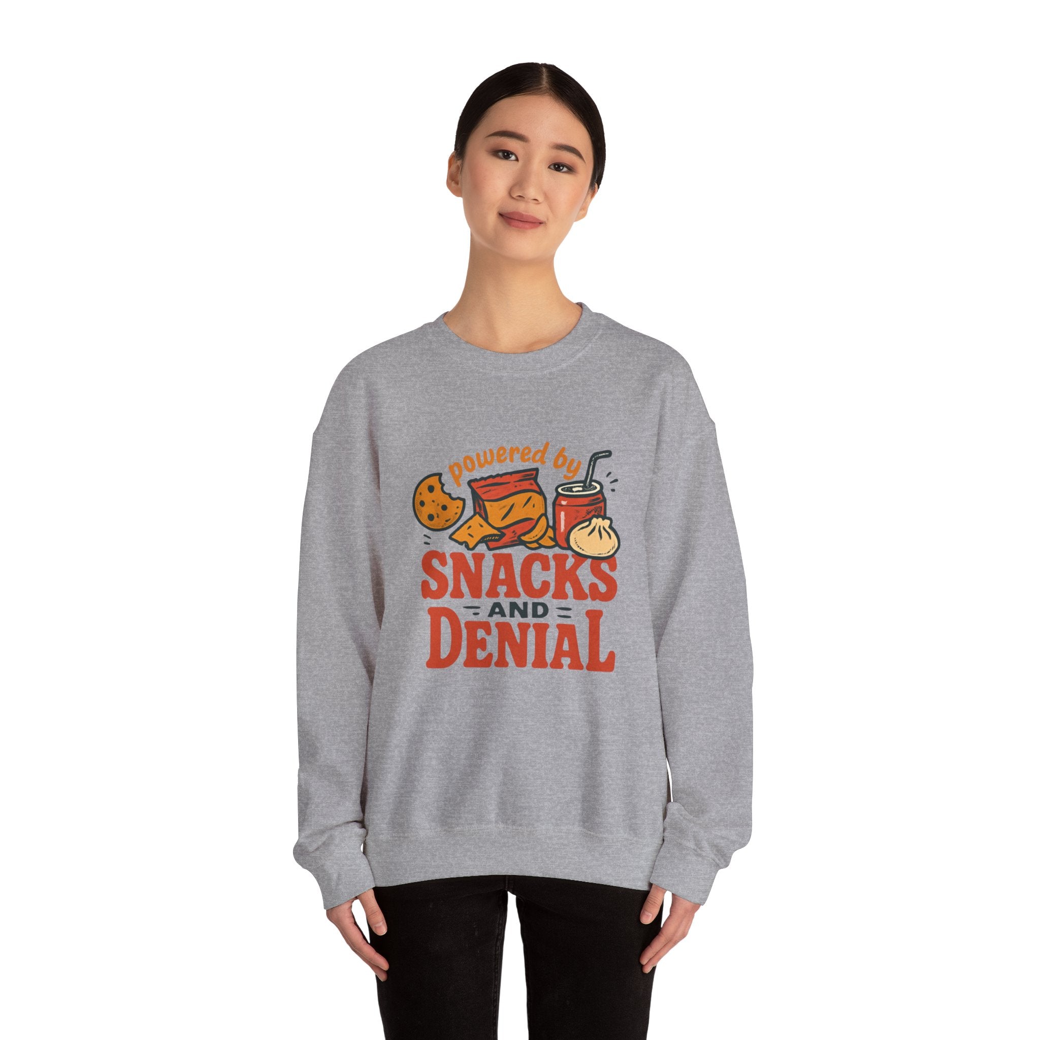 Crewneck Sweatshirt — "Powered by Snacks and Denial" Funny Snack Lover Pullover