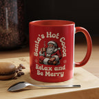 Red ceramic Santa Hot Cocoa mug with smiling Santa and "Relax and Be Merry" text, microwave and dishwasher safe