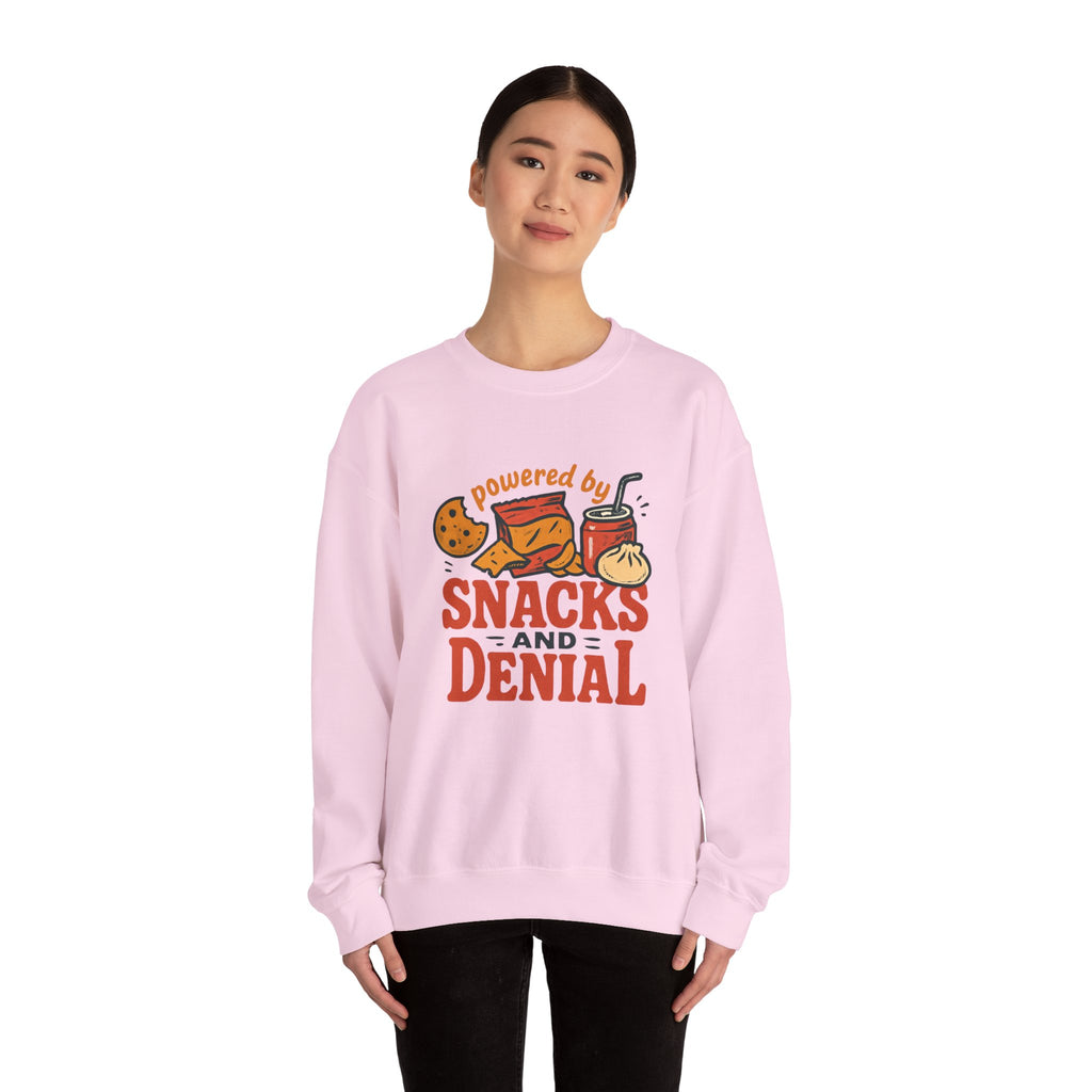 Crewneck Sweatshirt — "Powered by Snacks and Denial" Funny Snack Lover Pullover