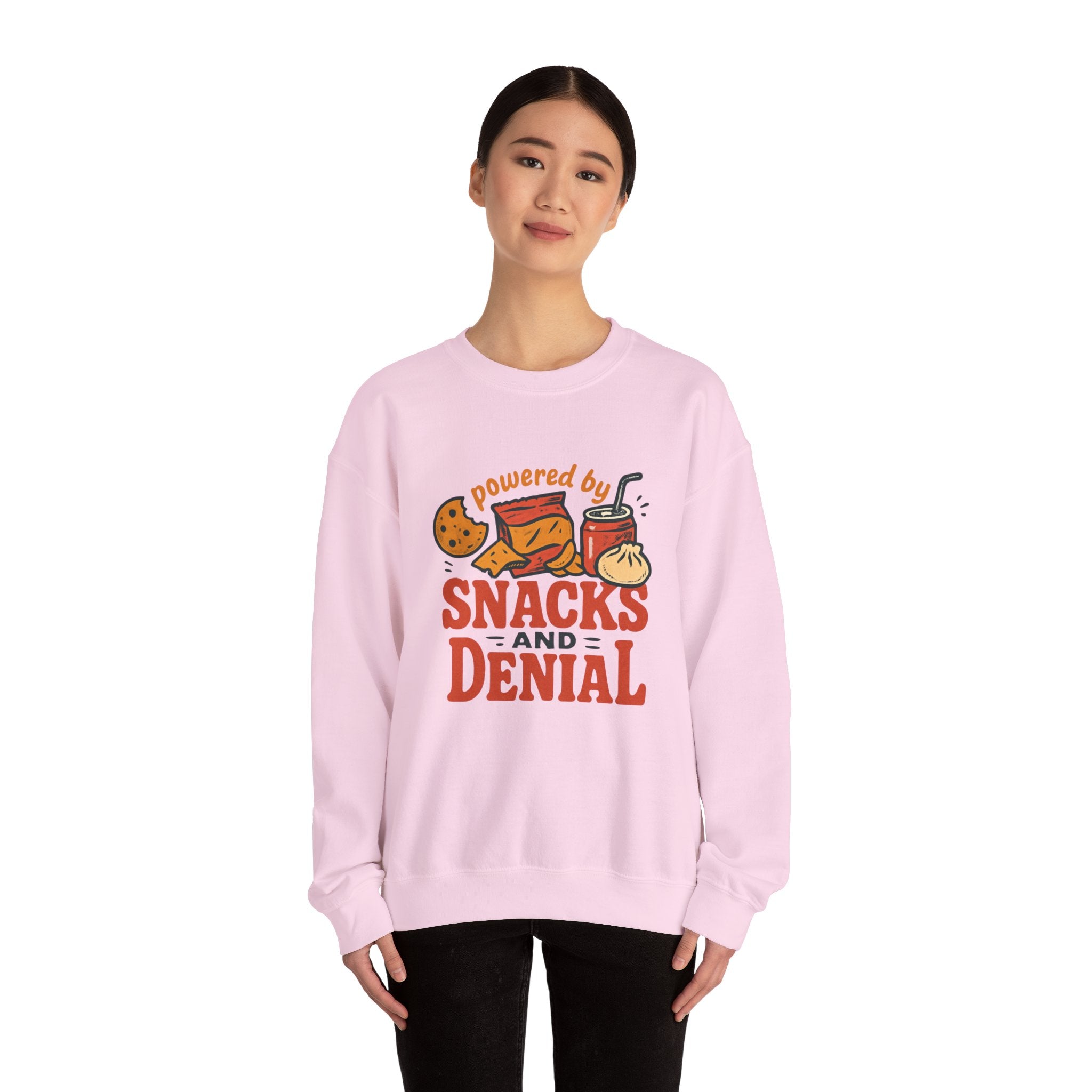 Crewneck Sweatshirt — "Powered by Snacks and Denial" Funny Snack Lover Pullover