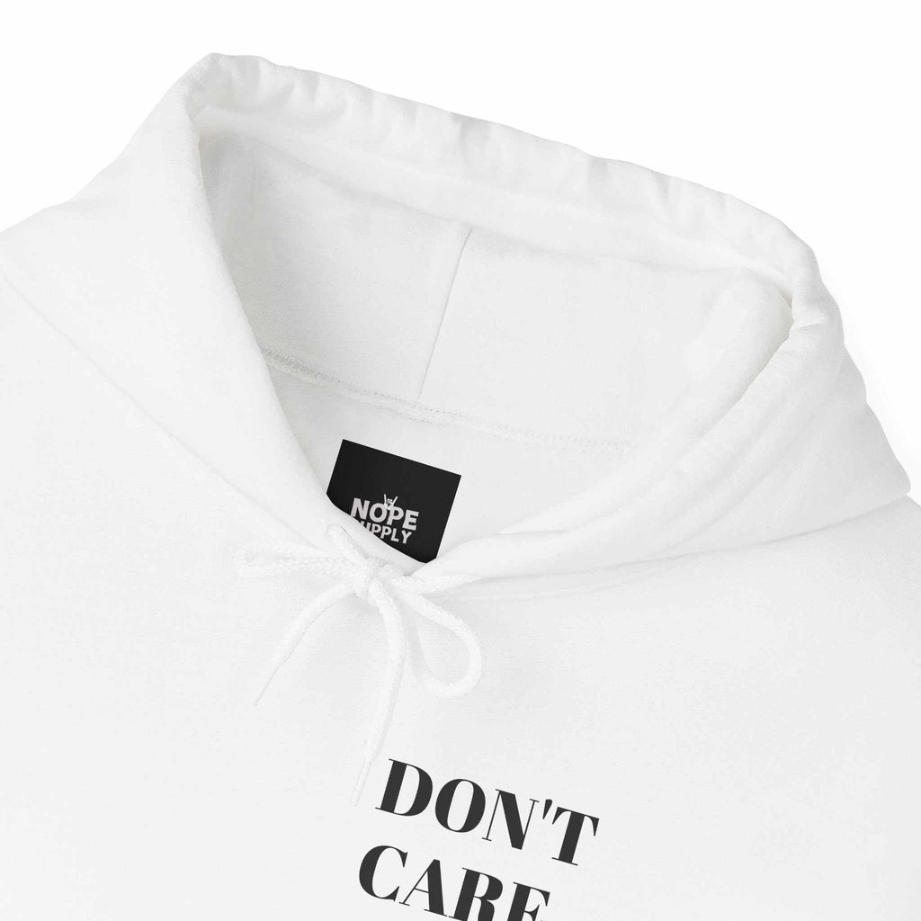 hoodies for men and women DON'T CARE HoodiePremium comfort. Zero interest. 100% mood.Product features- Spacious kangaroo pouch pocket for warmth and convenience.- Adjustable drawstring hood for a customizableNOPE SUPPLY