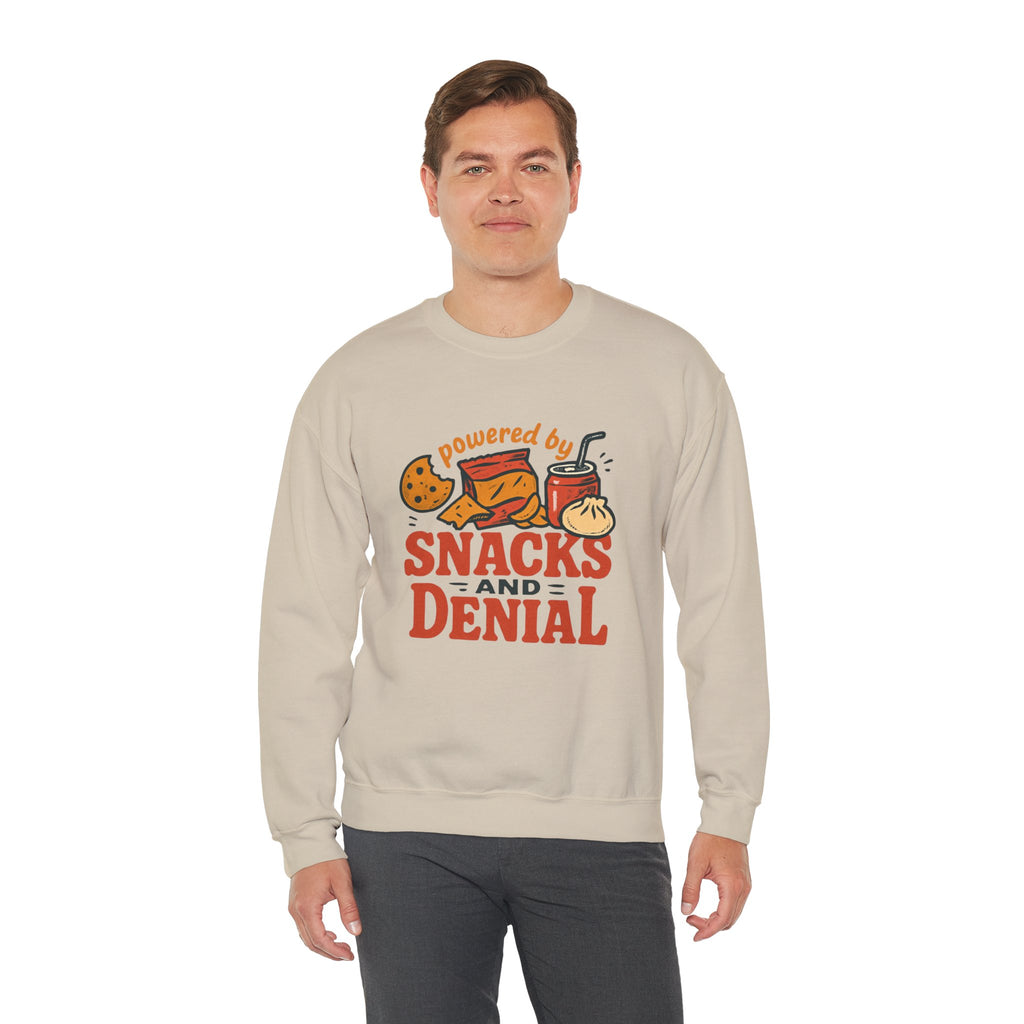 Crewneck Sweatshirt — "Powered by Snacks and Denial" Funny Snack Lover Pullover