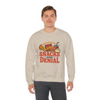 Crewneck Sweatshirt — "Powered by Snacks and Denial" Funny Snack Lover Pullover
