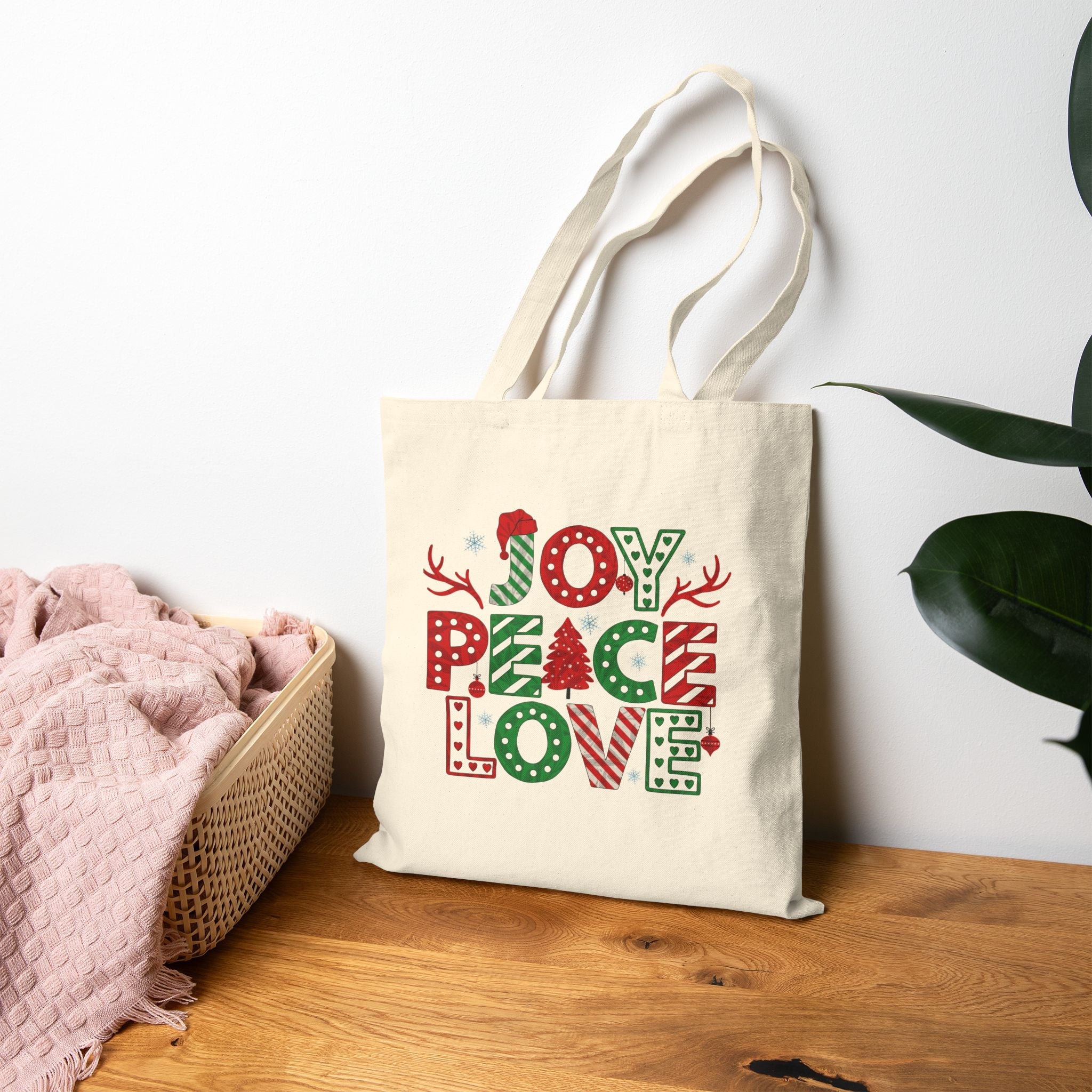 Christmas Joy Peace & Love Tote Bag festive canvas with holiday motifs in red and green