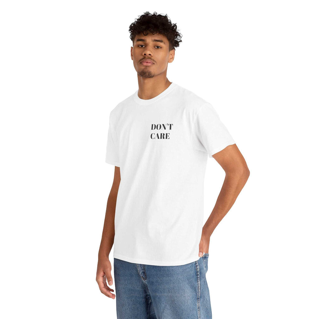 custom t shirts Young man wearing white DON'T CARE Tee with black text, made from 100% cotton, styled with blue jeans, casual fit