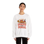 Crewneck Sweatshirt — "Powered by Snacks and Denial" Funny Snack Lover Pullover