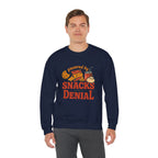 Crewneck Sweatshirt — "Powered by Snacks and Denial" Funny Snack Lover Pullover
