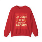 Red holiday sweatshirt with "OH DEER IT'S SWEATER SEASON" knit-pattern graphic and festive reindeer design
