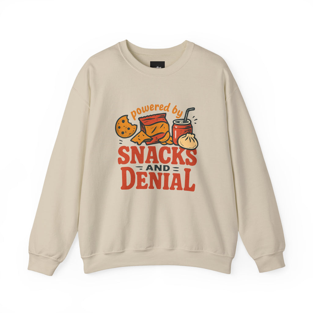 Crewneck Sweatshirt — "Powered by Snacks and Denial" Funny Snack Lover Pullover