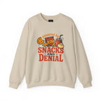 Crewneck Sweatshirt — "Powered by Snacks and Denial" Funny Snack Lover Pullover